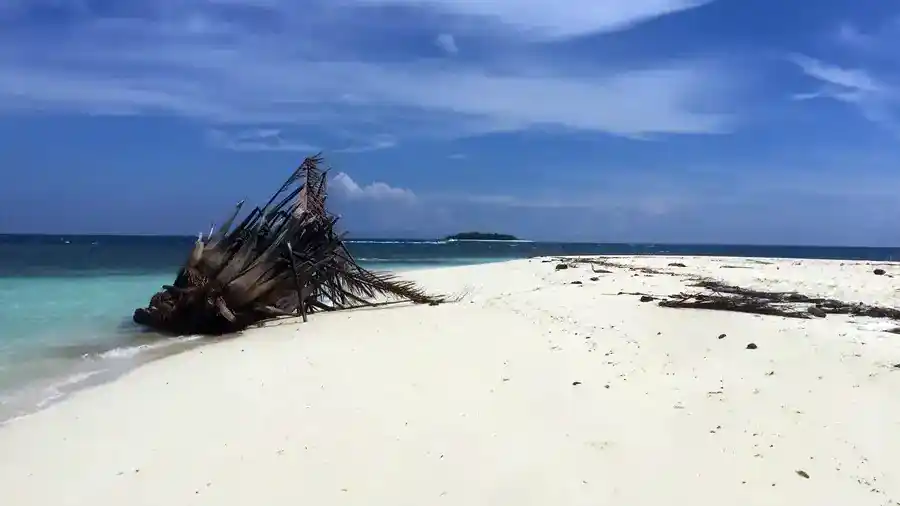 Beautiful beach and turquoise waters in Tun Sakaran Jelly Sea Resort